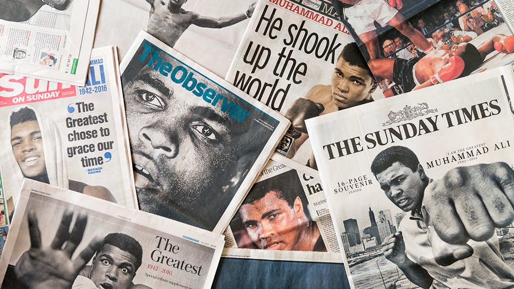 newspaper front pages featuring Muhammad Ali