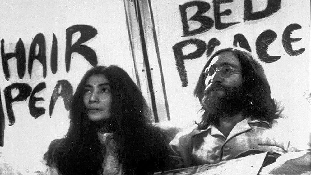 John Lennon and Yoko Ono begin a seven-day bed-in for peace