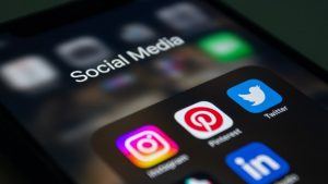phone with social media icons