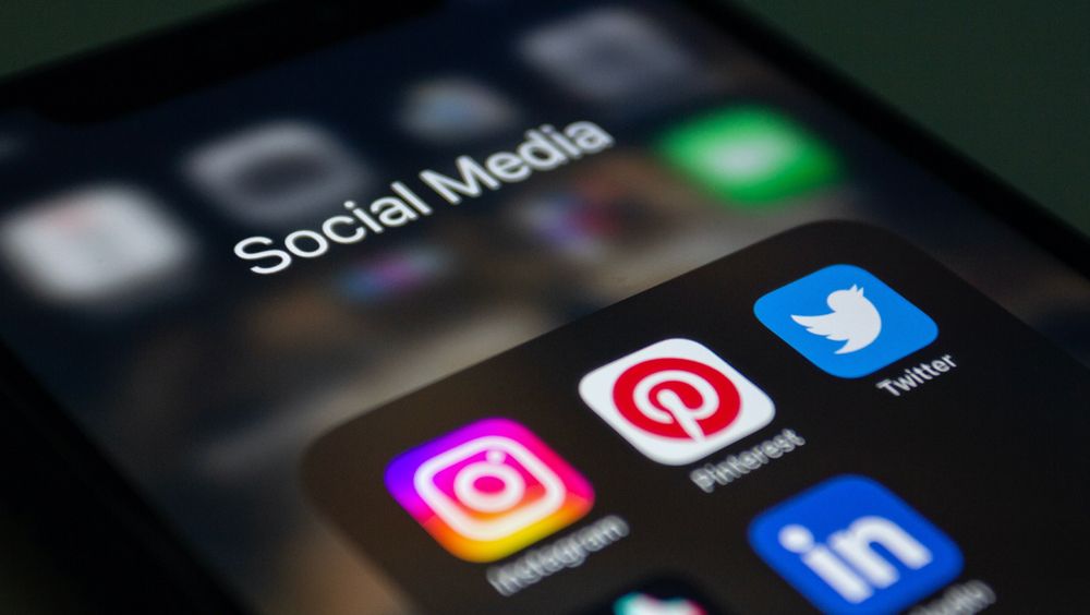 phone with social media icons