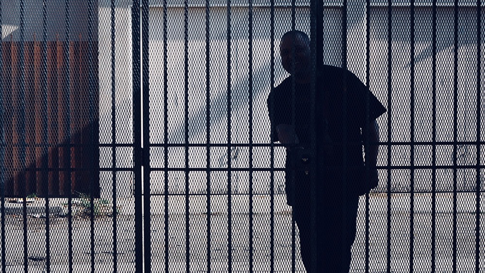 man behind bars