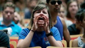 A protester shouts down White Nationalist Richard Spencer during a speech at the University of Florida in Gainesville, Fla., Oct. 19, 2017.