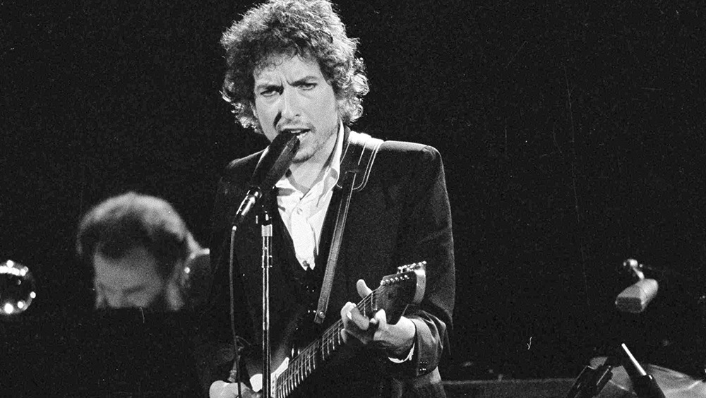 Bob Dylan performs with The Band at the Forum in Los Angeles on Feb. 15, 1974