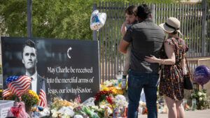 Supporters visit a memorial for Charlie Kirk at the Turning Point Headquarters in Phoenix on Sept. 11, 2025.