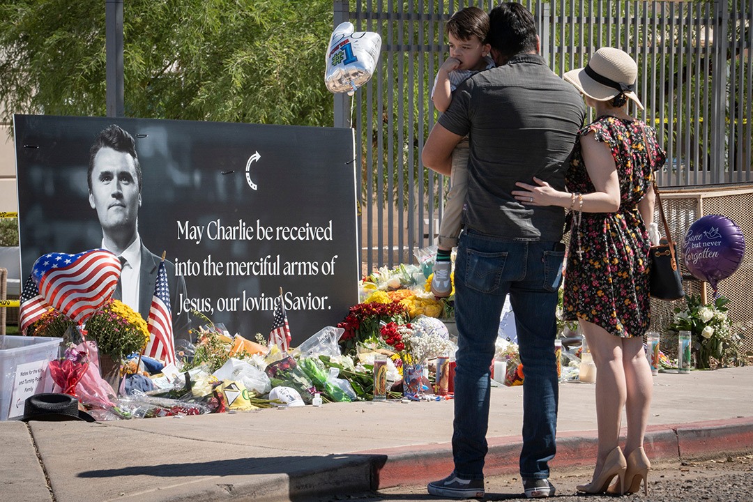 Supporters visit a memorial for Charlie Kirk at the Turning Point Headquarters in Phoenix on Sept. 11, 2025.