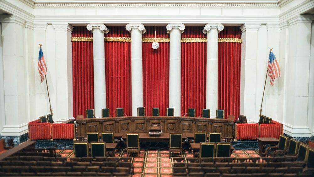 The interior of the Supreme Court, with the nine justices' seats sitting empty