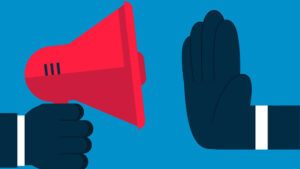 An illustrating showing a hand holding a megaphone facing another hand held up in a "stop position"