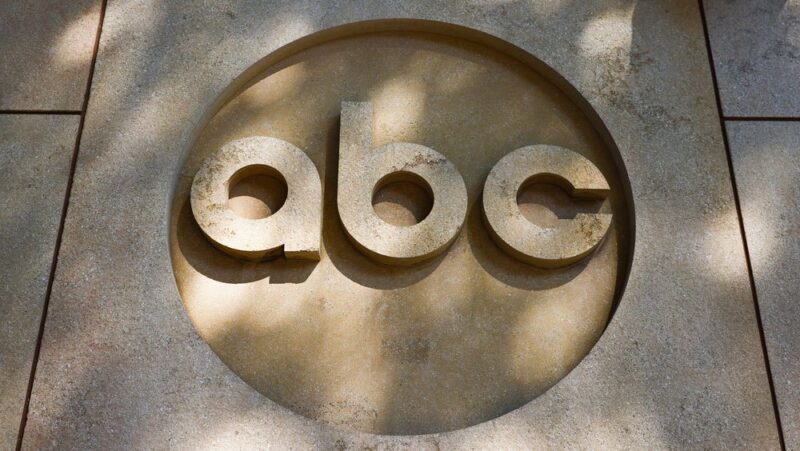 An image of the ABC logo engraved in stone (the lowercase letter 