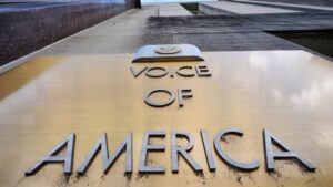 The Voice of America name appears on the VOC building
