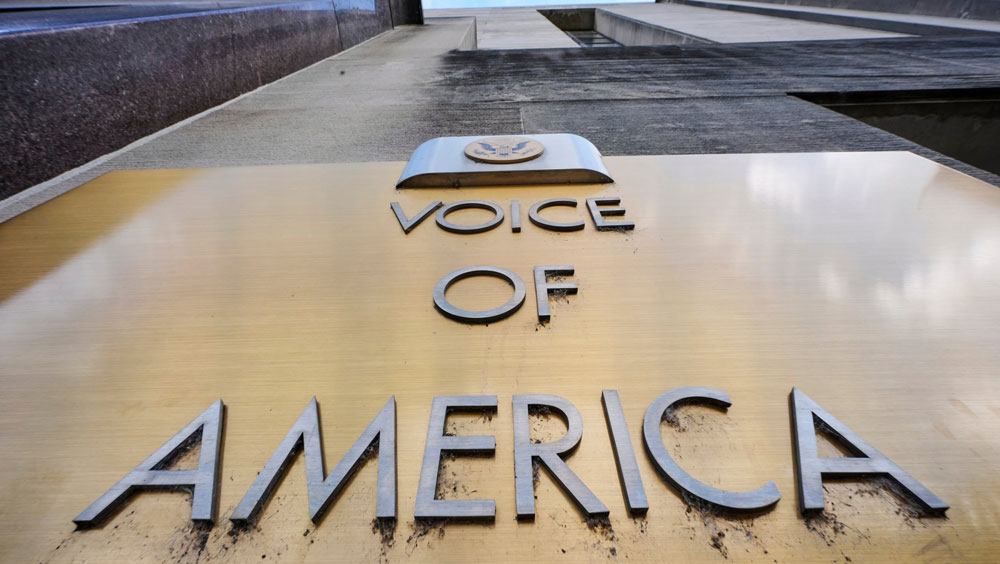 The Voice of America name appears on the VOC building